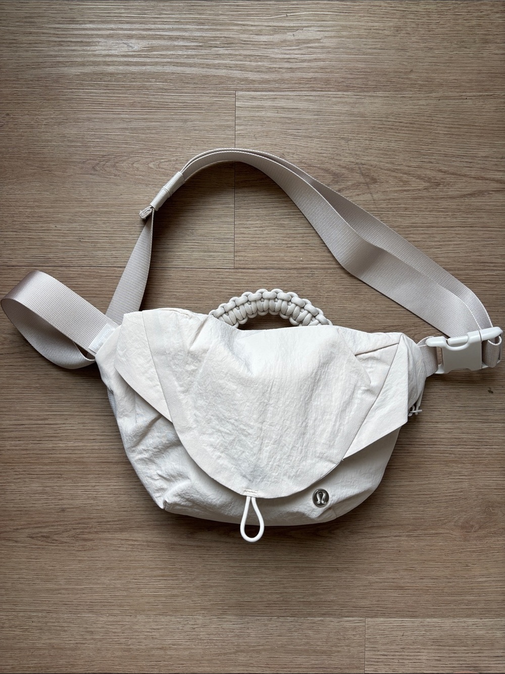 Lululemon Minimalist Cream Crossbody Bag with Braided Handle